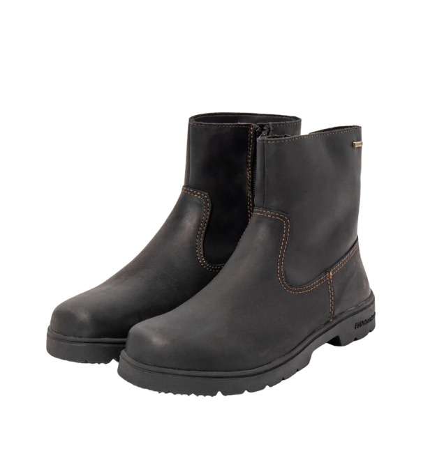 Pair of black short-shaft ankle boots, with ochre stitching and a lugged sole.